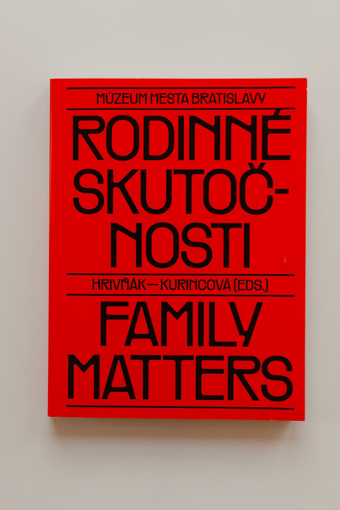 Red book cover with the title in large black lettering.