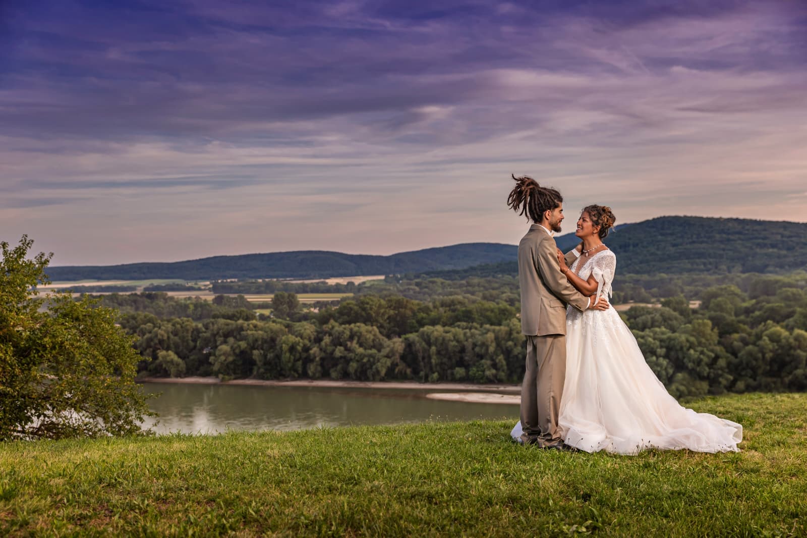 View of a married couple during a wedding photo shoot at Devín Castle
